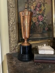 1949 Baby Beef Show Champion Trophy. Copper W/Bakelite Base. 17” Tall.