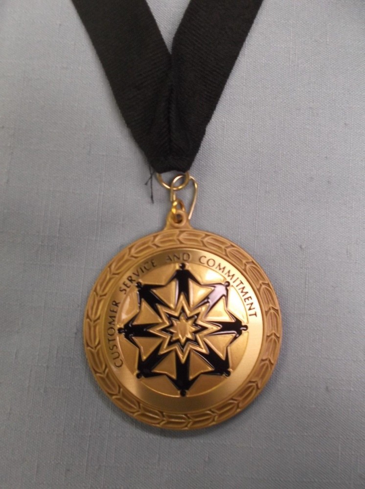 Customer Service and Commitment 2 1/2″ quality medal black ribbon