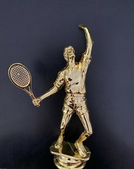 A variety of Tennis Man trophy toppers