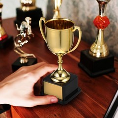 Golden Plastic Trophy Cup for Sports and Game Achievements with Square Base