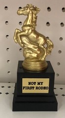 Not my first rodeo, g.o.a.t, winner winner chicken dinner trophies