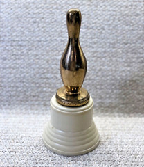 Vintage MCM Bowling Pin Trophy Brass on ivory-color base, Nice patina and weight