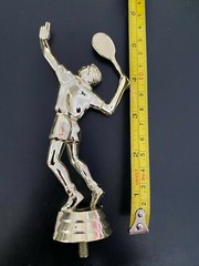 A variety of Tennis Man trophy toppers