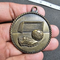 Vintage 1995 Engraved Bronze Soccer Medal 2 Inch Wide shows signs of wear such